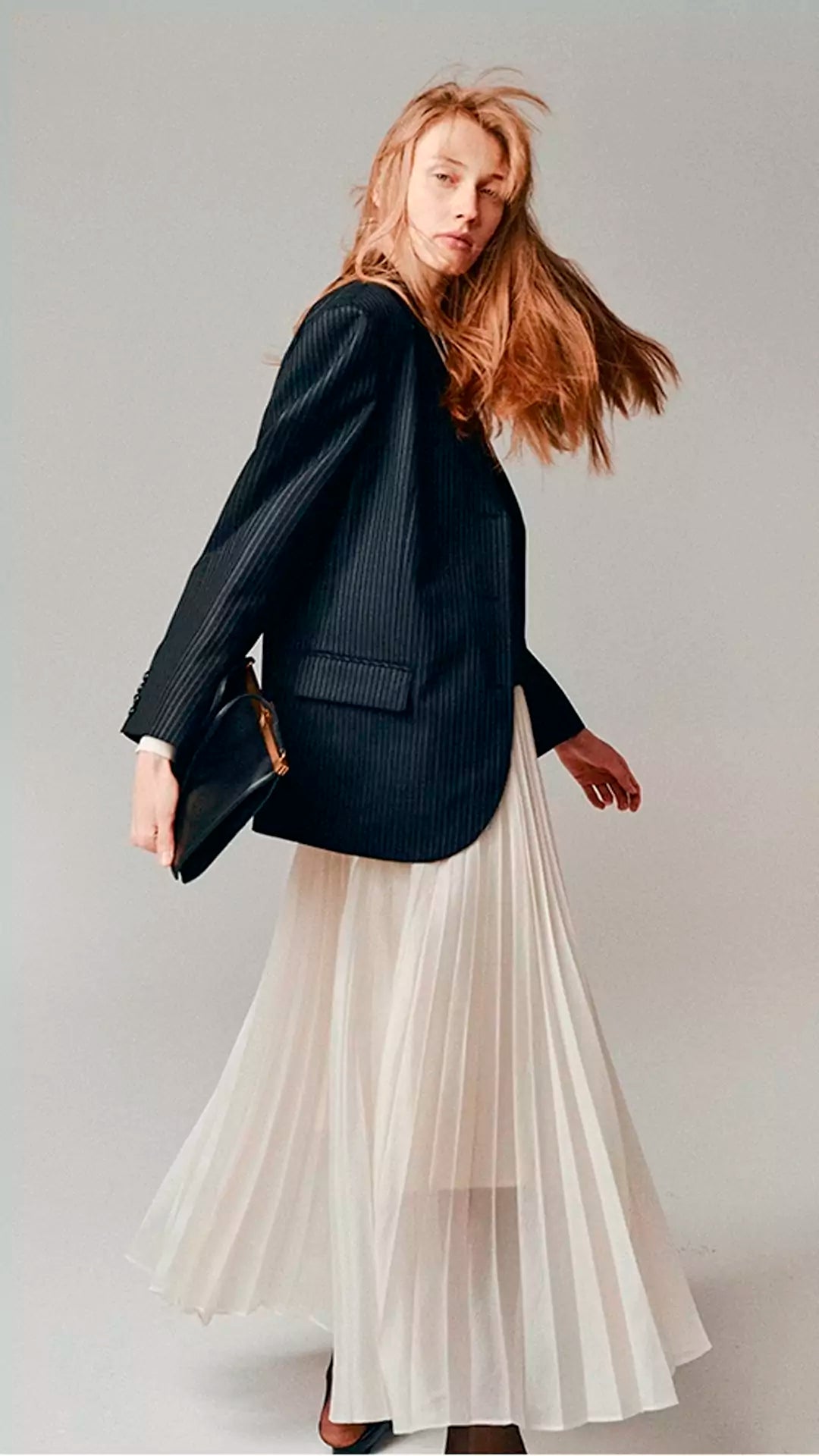 Elegant and Classic Pleated Flowing Midi Skirt